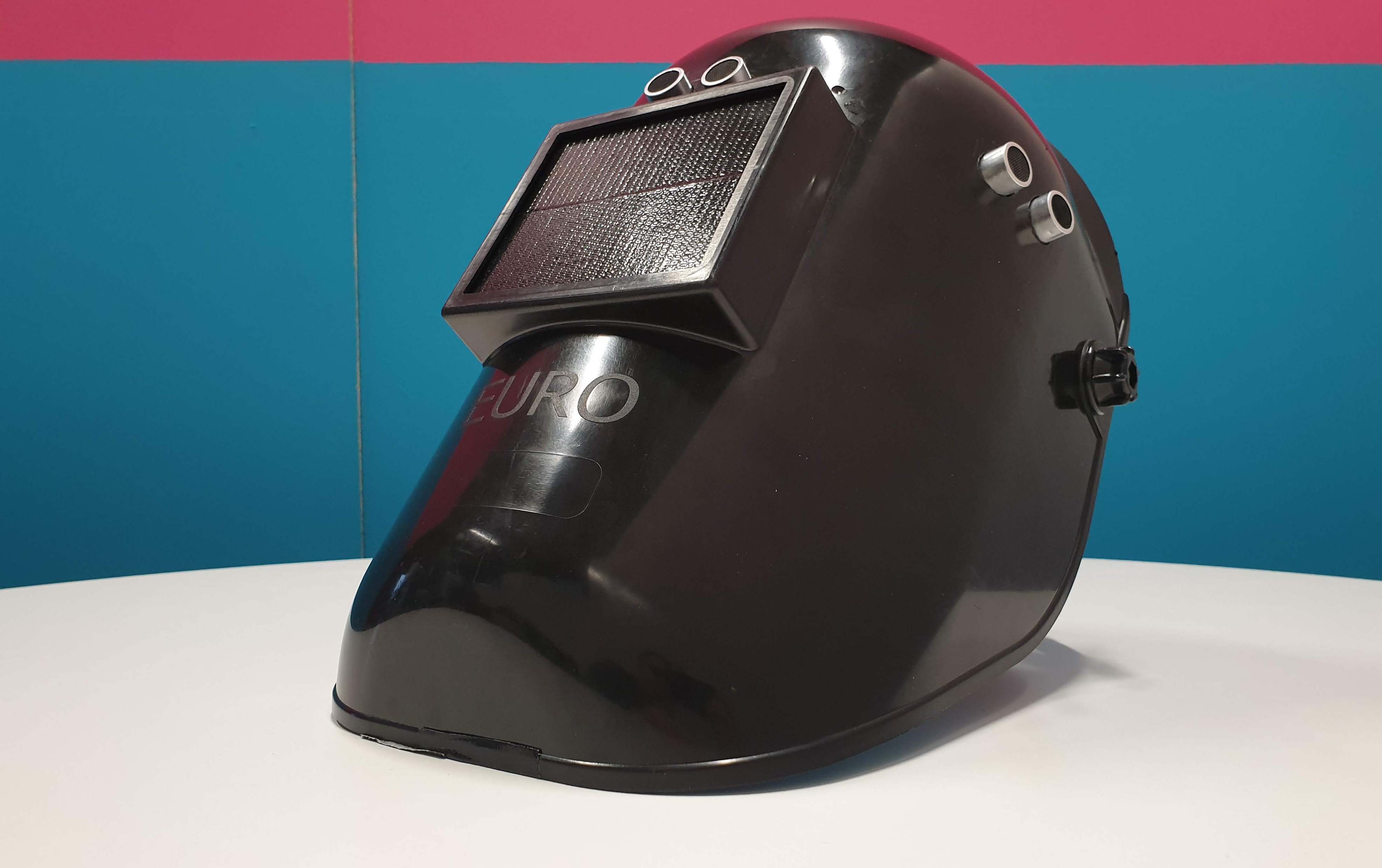 A welding helmet with ultrasonic sensors put in